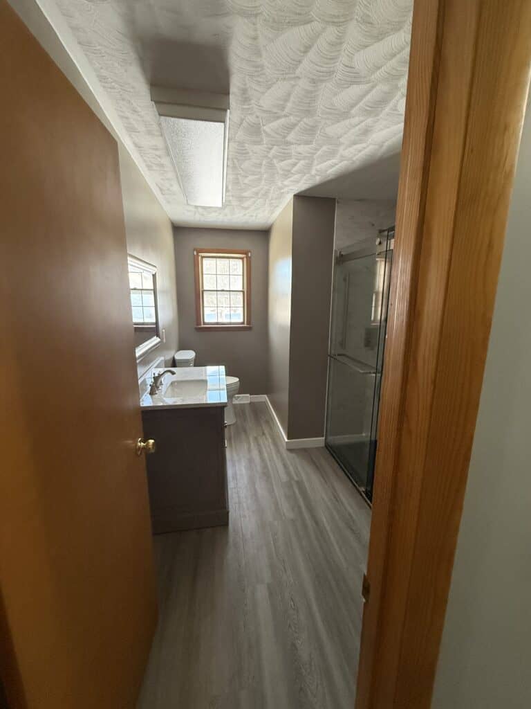 Bathroom with modern fixtures and natural light.